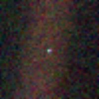 Tiny fuzzy image of earth taken by Voyager 1 at a distance of 4 billion miles.