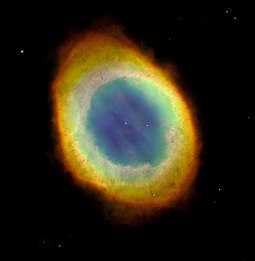 Photograph of the Ring Nebula in Lyra (M57) by the Hubble Space Telescope.