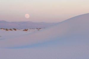 Photograph of the moon rising over White Sands, New Mexico. Copyright Patrick J. Alexander