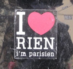 Bumper sticker reading "I [heart] rien, i'm parisien" (where a heart symbol appears after the word "I."